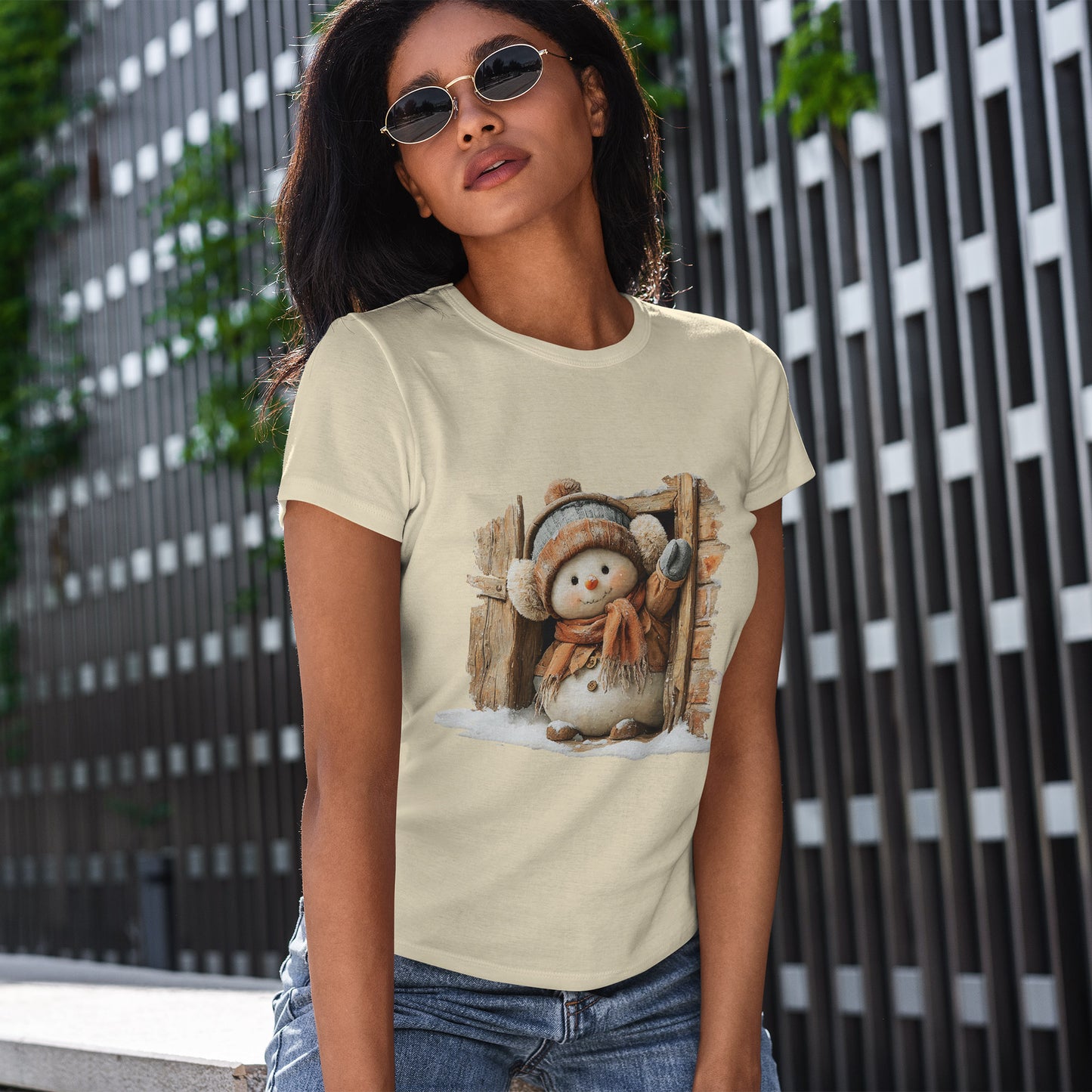 Waving Doorway Snowman Christmas T-Shirt - Cabin Snowman in Beanie & Ear Muffs