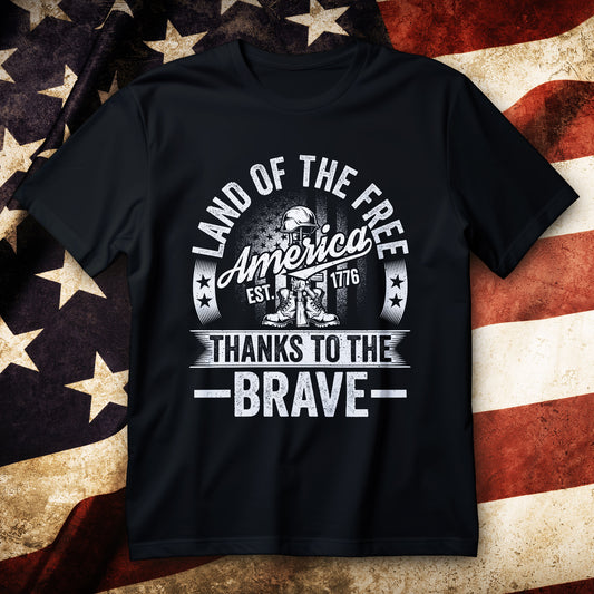 land of the free t-shirt - battlefield cross with boots rifle helmet over distressed american flag