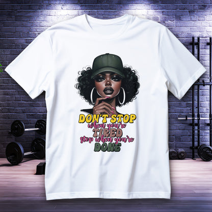 Motivational Black girl graphic with quote “Don’t stop when you’re tired, stop when you’re done” on tee