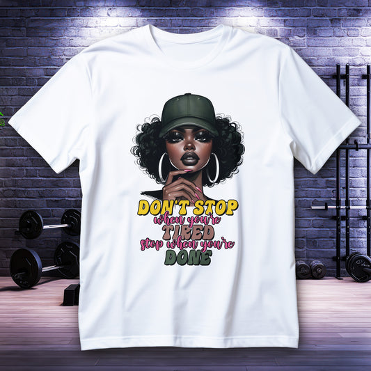 Motivational Black girl graphic with quote “Don’t stop when you’re tired, stop when you’re done” on tee