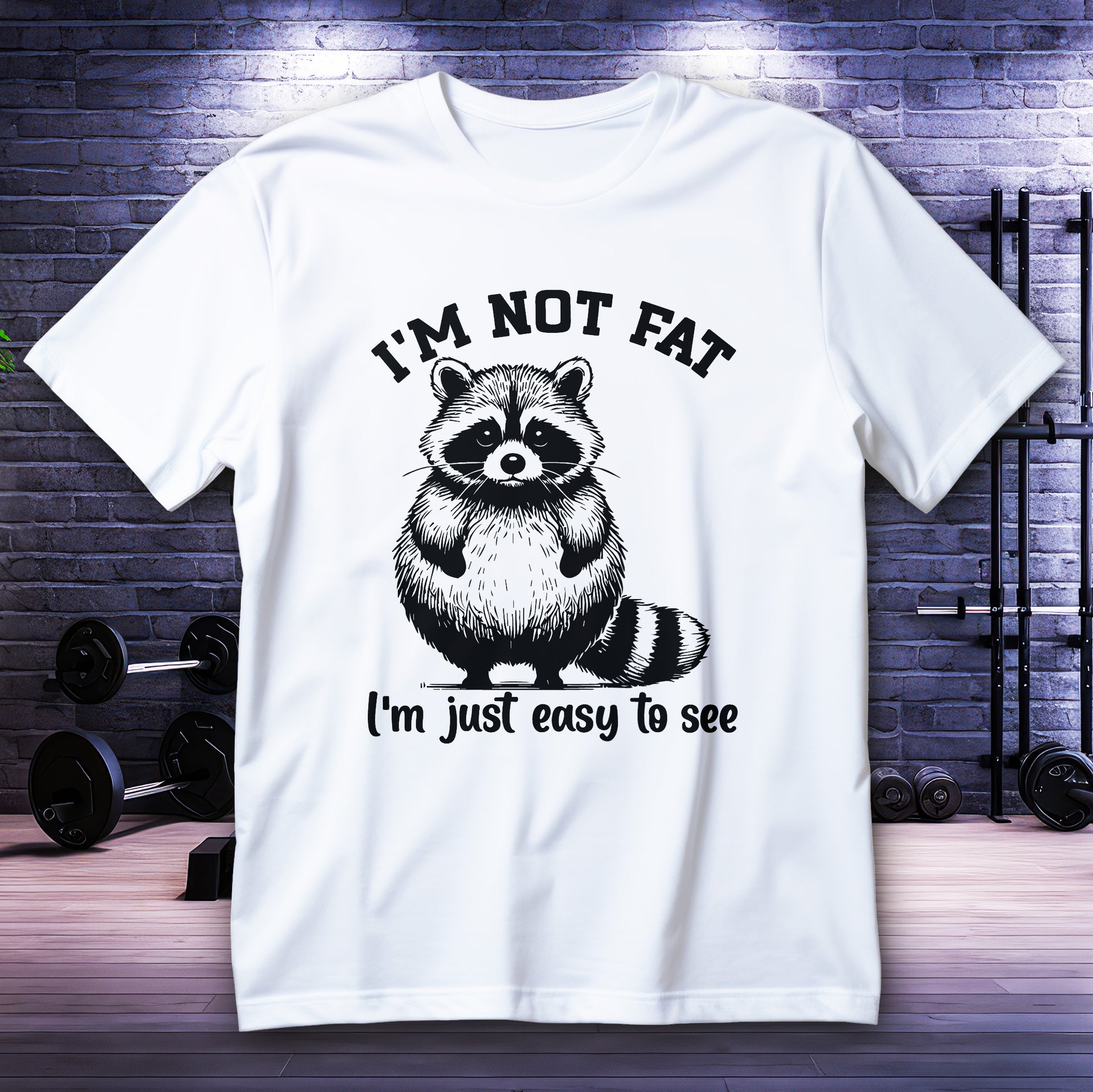 I’m Not Fat I’m Just Easy to See Shirt with cute raccoon graphic and bold quote, funny body-positive humor tee