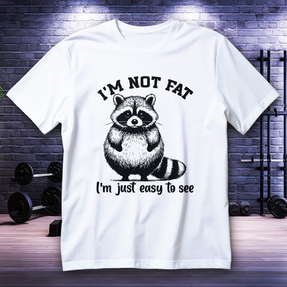 I’m Not Fat I’m Just Easy to See Shirt with cute raccoon graphic and bold quote, funny body-positive humor tee
